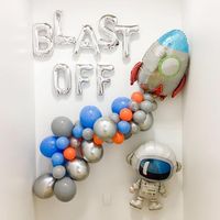 Blast Off! If you're throwing a space party then you're going to need decor that's out of this world! We've made that easy for you by putting together these FOUR party decor pieces as a set or sold individually. You can bring the WOW with minimal effort and have your guests saying you throw the cutest parties! Listing includes your choice of individual items or set: 6ft DIY balloon garland kit in colors shown (gray, orange, periwinkle, silver, chrome silver) "BLAST OFF" letter balloons Astronaut