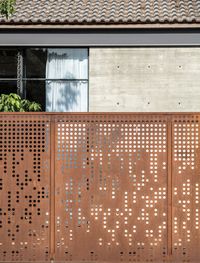 Glass walls and covered walkways intertwine Israeli house and garden