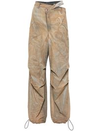 beige cotton blend washed denim embroidered logo to the rear cut-out detailing high waist belt loops concealed fly and button fastening two side slit pockets two rear patch pockets wide leg drawstring ankles