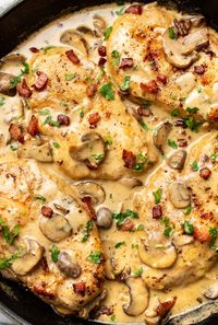 This Chicken Riesling recipe is a restaurant favorite, but it's so simple to make at home! It has crispy bacon and mushrooms in a creamy white wine sauce.