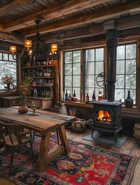 Log Cabin dinner room, wood burner. High ceilings!