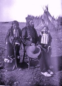 SOUTHERN ARAPAHO MAN WITH HIS TWO SONS , 1893