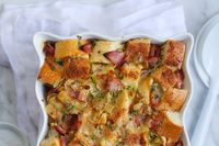 Is there anything better than a great ham and cheese sandwich? Well, if there ever was a contender, I'd say it'd be this recipe for Croque Monsieur Savory Bread Pudding. Or Strata. Or whatever the heck you want to call it. This recipe is basically a giant deconstructed Croque Monsieur (aka ham, c...