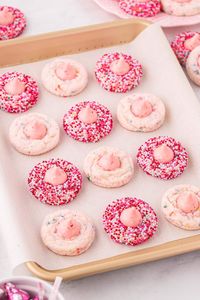 strawberry kiss cookies on baking pan