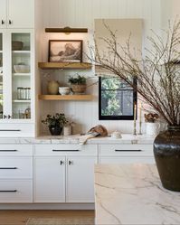 Check out these gorgeous kitchens featuring vertical shiplap as the backsplash instead of traditional tile! This is a fun and unique way of adding some charm to your kitchen.