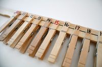 DIY Number Line made with clothespins and a paint paddle