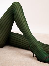 Get WICKED in the timeless elegance of our striped patterned tights, designed to slim and shape your figure with each step. Available in Green. 90% Poliamid 10% Elastan