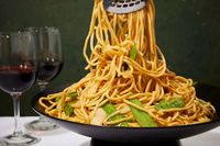 Eileen Yin-Fei Lo’s Longevity Noodles pair light, umami-seasoned lo mein noodles with crunchy snow peas and water chestnuts.