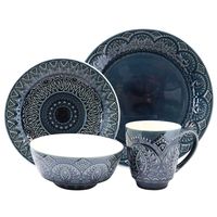 Add a touch of sophistication to your next meal with Elama Navy Mandala 16 Piece Stoneware Dinnerware Set. This set boasts a beautiful textured design which gives a nod back to old world charm and extravagance. Each piece is decorated with an intricate bohemian design. Ideal for every day casual settings as well as formal gatherings. Crafted from high quality stoneware for a durable and long lasting design.