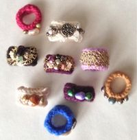 Make little wool rings from orphan gloves from mrspollyrogers.com.  Video, too!