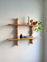 Designed and made in Brooklyn! The Wave wall mounted shelf is shown here in solid red oak with a natural finish. Keyhole brackets are installed in the shelf and can be hung with wall anchors. Made to order with a 2-3 week lead time Contact me for details on custom sizes or other lumber options