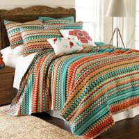 Add bold colors to your bedroom with the vibrant scarlet and turquoise of the Levtex Home Corona Quilt Set. This machine-washable set is made from pre-washed Polyester, and includes a quilt, and comes with matching pillow shams. Imported.