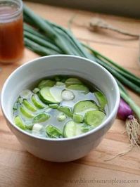 A quick & easy recipe for pickled cucumbers! Refrigerator pickles made with cucumber slices, vinegar, onions, salt & a bit of sugar if you like. #pickles #cucumbers