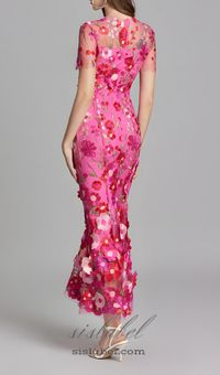 This exquisite piece features delicate floral embroidery on a sheer mesh fabric, creating a stunning effect. With its fitted silhouette and elegant fishtail hem, this dress exudes luxury and sophistication. Perfect for any special occasion. - Floral Embroidery- Mesh Fabric- Fishtail Silhouette Colour may vary due to li