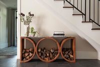 Peg Woodworking's Totem features coopered oak creating a sculptural base and stone top for textural contrast.  This console is perfect for your contemporary entry way and living area.  Completely customizable to scale, shape configuration, finish, and stone type.