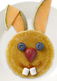 Kids Creative Meal Idea ~ Easter Breakfast ~  Kick off the day in true Easter style with these adorable bunny pancakes. This delicious meal is not only easy to make (you don’t even have to shape the batter) but the fruit accessories make it a balanced meal that will give your kids the energy they need to kickstart their day.