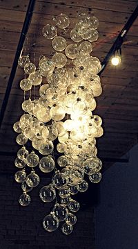 "bubble" chandelier made from clear Christmas ornaments on string