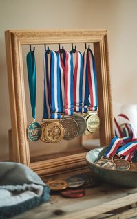 🎨 Get crafty with DIY Medal Display ideas that highlight your race medals and personal achievements. Explore innovative Ways To Display Medals, including custom designs and creative setups. Perfect for any runner looking to add a personal touch to their medal collection! #MedalDisplayIdeasDIY #RaceMedalDisplay #WaysToDisplayMedals