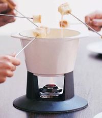 Find the recipe for Cheese Fondue and other swiss cheese recipes at Epicurious.com