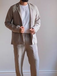 The JASPER Linen Suit is not just another ensemble; it's your ultimate go-to for various occasions, be it a formal event, a romantic date, or a busy day at the office. Tailored to perfection according to your measurements, the JASPER Linen Suit embodies versatility and inclusivity, catering to individuals of any gender with its customizable design. Our Model is wearing MED color suit set. Crafted from premium linen suiting fabric, this suit strikes the perfect balance between structure and comfo