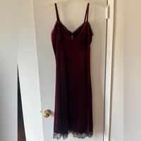 Super Cute Never Before Worn Velvet Dress. It’s Got A Little Bow At The Front And A Little Metal Cross Charm To Complete Your Goth Desires.