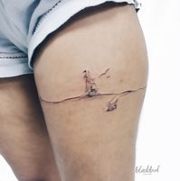 Around the thigh tattoo - very original