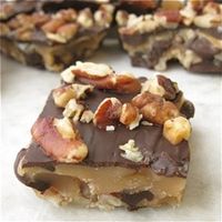 King Arthur Dark Chocolate Buttercrunch: Like a Heath Bar! 27+ 1 cup (2 sticks, 1/2 pound) butter* 1 1/2 cups (10 1/2 ounces) sugar 3 tablespoons water 1 tablespoon light corn syrup 2 cups (8 ounces) diced pecans or slivered almonds, toasted 1 pound semisweet or bittersweet chocolate, finely chopped (chocolate chips are an easy solution here; you’ll need about 2 2/3 cups)