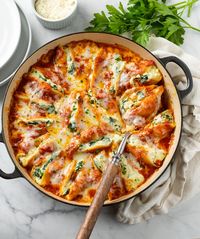 This Classic Stuffed Shells recipe is easy to make with a 4-cheese blend of ricotta, mozzarella, Parmesan, and cream cheese! This is a great make ahead meal that's freezer friendly!