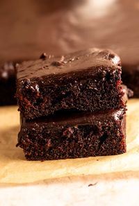 Stack of two slices of chocolate buttermilk cake.