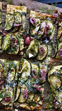 336K views · 61 reactions | We’ve got this easy and delicious Zucchini Tart on repeat all through the spring, summer & into autumn🌱💚 

@myfruitologist 
 
Ingredients
 
3 medium zucchini, sliced on angle, 3mm thick
2 clove garlic
1 lemon
Salt, pepper
1 tbsp olive oil + extra to drizzle
 
200g cottage cheese
3 tbsp grated Parmesan 
3 tbsp basil pesto
30cm square puff pastry
 
¼ cup pitted kalamata olives, halved
Handful dill, roughly chopped
Small piece Parmesan, to serve
Lemon wedges, to serve
 
Method
 
-  Preheat an oven to 210C.
 
-  Grate 1 clove of garlic into the cottage cheese along with the zest of half a lemon  and a little pepper. Mix this and set aside.
 
-  Into the zucchini, grate the remaining garlic, ½ of lemon, a little salt, pepper and the 1 tbsp olive oil. Set aside
Lay 