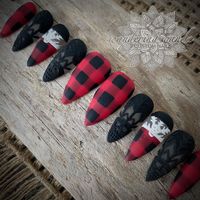 Hand painted buffalo plaid press on nails with negative space skull-snowflakes. Matte finish. *Long Stiletto shape shown  Each set is unique, no two sets are identical. Your new salon quality nail enhancements made by a professional nail artist, come with 10 custom nails with protective packaging, detailed instructions for application & removal. One application kit included per order.  Kit includes: A cuticle pusher, wood file, buffer, alcohol wipe, nail tabs, glue & a lotion spatula. Additional