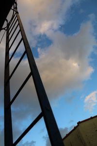 golden clouds on a fire escape / new york city