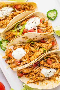 Deliciously seasoned shredded chicken tacos are the perfect choice for taco night. This chicken taco recipe is fast and simple to make any day of the week.