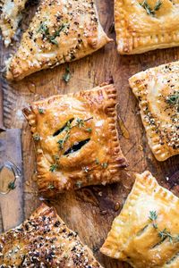 Caramelized Onion, Spinach, and Cheddar Flaky Pastries | halfbakedharvest.com #onions #tarts #fall #autumnrecipes #easy #holiday #appetizer