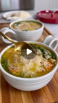 Nicole Keshishian Modic | KALEJUNKIE® on Instagram: "@kalejunkie HEARTY TUSCAN WHITE BEAN SOUP, an OG KJ recipe that’s been a community (and Google!) favorite for years—so if you are new here, HI! WELCOME! Make this! This plant-based soup is so simple to make but it’s packed with flavor and it’s actually filling—gone are the days of watery, boring soup!⁣ ⁣ The recipe is here (below), but if you want me to DM it to you, along with the link to my blender, just comment ‘RECIPE’ and I will send you both! The recipe cards always include more detailed information about the recipe and you can save/download it.⁣ ⁣ Makes 6 servings⁣ ¼ cup extra virgin olive oil⁣ 1 yellow onion, diced⁣ 2 large shallots, chopped⁣ 4 cloves garlic, mashed⁣ 2 large carrots, chopped into coins⁣ 2 celery stalks, diced⁣ 3