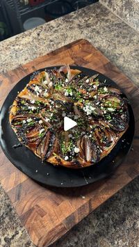 Tasty on Instagram: "Seven ingredients, endless flavor! This savory shallot tart is simple yet stunning—perfect for a cozy night in or a brunch centerpiece. Find the recipe below and linked in bio @groovyfoodiess   INGREDIENTS 1 sheet puff pastry, cut into an 8-inch circle 10 shallots, peeled and halved 1 tbsp balsamic vinegar glaze 1 tbsp honey, plus more for serving 1 tsp fresh thyme leaves ¼ cup crumbled goat cheese, plus more for garnish 1 tbsp compound butter of choice Kosher salt and freshly ground black pepper Minced chives, for garnish   PREPARATION 1. Preheat the oven to 400°F (200°C). 2. Melt the compound butter in a large 8-inch oven-safe skillet over low heat. 3. Once it’s lightly bubbling, add in shallots, cut side down, placing them neatly and in a circle. 4. Let them caramel