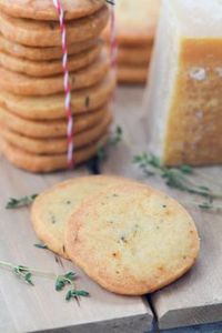 Parmesan Thyme Crackers are easy to make and are the perfect nibble to serve with cocktails. Also makes a charming edible gift.