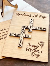 "One of a kind Christmas, Mother's Day, or Father's Day card specially made for you. It's a card and a gift two in one! They are perfect for Scrabble lovers. Each card comes with a wood stand, ready to be displayed and can be used as Christmas (or Mother's Day, Father's Day) decoration or tier tray decor. Personalized your wood card with 1. Family name or title engraved on the top 2. Small wood name tiles glue on the card 3. Optional: Your message to the recipient engraved on the reverse side. (