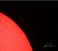 Closer view of the looping solar prominence.