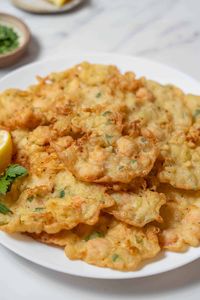 These crispy shrimp fritters from Cadiz in southern Spain are the perfect light summertime snack. Pair them with a glass of dry sherry for a real taste of Andalucia!