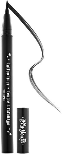 Kat Von D Tattoo Liner, What it is: A liquid eyeliner with an innovative brush tip for effortless, precise application. What it does: Achieve eye perfection with this high-pigment, waterproof liner that stays put all day for a fade-, melt-, crack-, and run-resistant finish. The superfine and flexible brush tip glides across the lashline for incredibly fluid application, allowing you to create a variety of looks with ease.