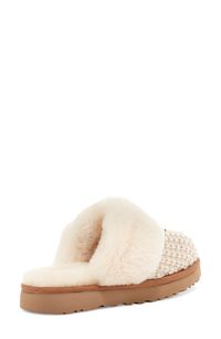 Sumptuous shearling trim enhances the luxe comfort of this classic knit slipper. 1" heel; 3/4" platform (size 9) Textile and genuine-shearling upper/textile, wool and genuine-shearling lining/synthetic sole Shearling may be sourced from Australia, Ireland, the UK or the USA. See packaging for confirmed country of origin Imported