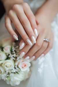 Get inspired with these stunning wedding nail ideas! Whether you're a bride-to-be aiming for classy bridal nails or seeking unique wedding nail designs, we've got you covered. Elevate your bridal look with the perfect wedding nails that will leave everyone in awe. From elegant and timeless to modern and chic, these wedding nails are sure to be a show-stopper on your big day. Say "I do" to fabulous nails that will complete your dream wedding look!