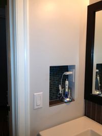 outlet in niche instead of medicine cabinet on side wall