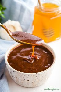 This Homemade Honey Garlic Barbecue Sauce is perfect on grilled meats, burgers, ribs and more! It's easy to make in one pot and it's packed with sweet and savoury flavour! Recipe from thebusybaker.ca! #honey #garlic #barbecue #sauce #homemade #bbq #barbecuesauce #ribs #burgers #summer