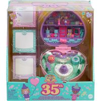 Happy Birthday, Polly! Celebrate the 35th anniversary of Polly Pocket with this special edition remake of the classic Partytime Stamper Compact from 1992. Originally debuting from the Party 'n Play Collection, this must-have collectible includes 2 iconic heritage dolls, 3 party stamps, an inkwell, and 12 Polly stationary cards. Featuring a nostalgic heart-shaped outer with celebratory details like icing and sprinkles, this ode to Polly Pocket is all things special and sweet. The premium window b