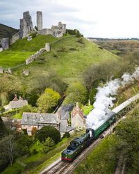 Corfe Castle & Corfe Village in Dorset🌷🍃 Photo: @danielrayson