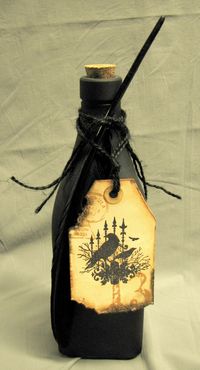 Black bottle, crow feather ... would you drink what's inside?  (ghostly, manical laughter heard down the hall)