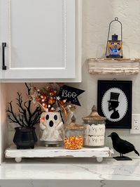 This spooky little kitchen vignette was so fun and easy to do! Even if you don’t have the exact same Halloween Decor, you can take the basic idea and use what you do have. I do have a reel showing how I put this together and tagged some of the Decor in it. You can find that on my page KH_Decor Follow along for more! ( Halloween, spooky, ghost, treats, decor, accents, kitchen)