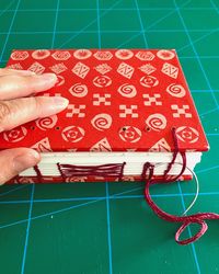 Making new Coptic stitch and French link binding notebook.